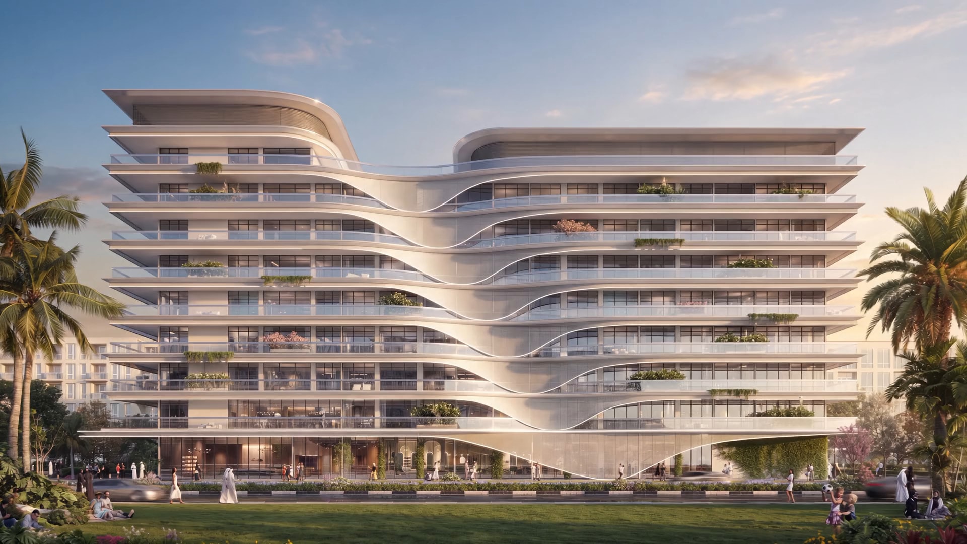 Front facade of Bond Enclave in evening light, wave-shaped terraces over a green lawn